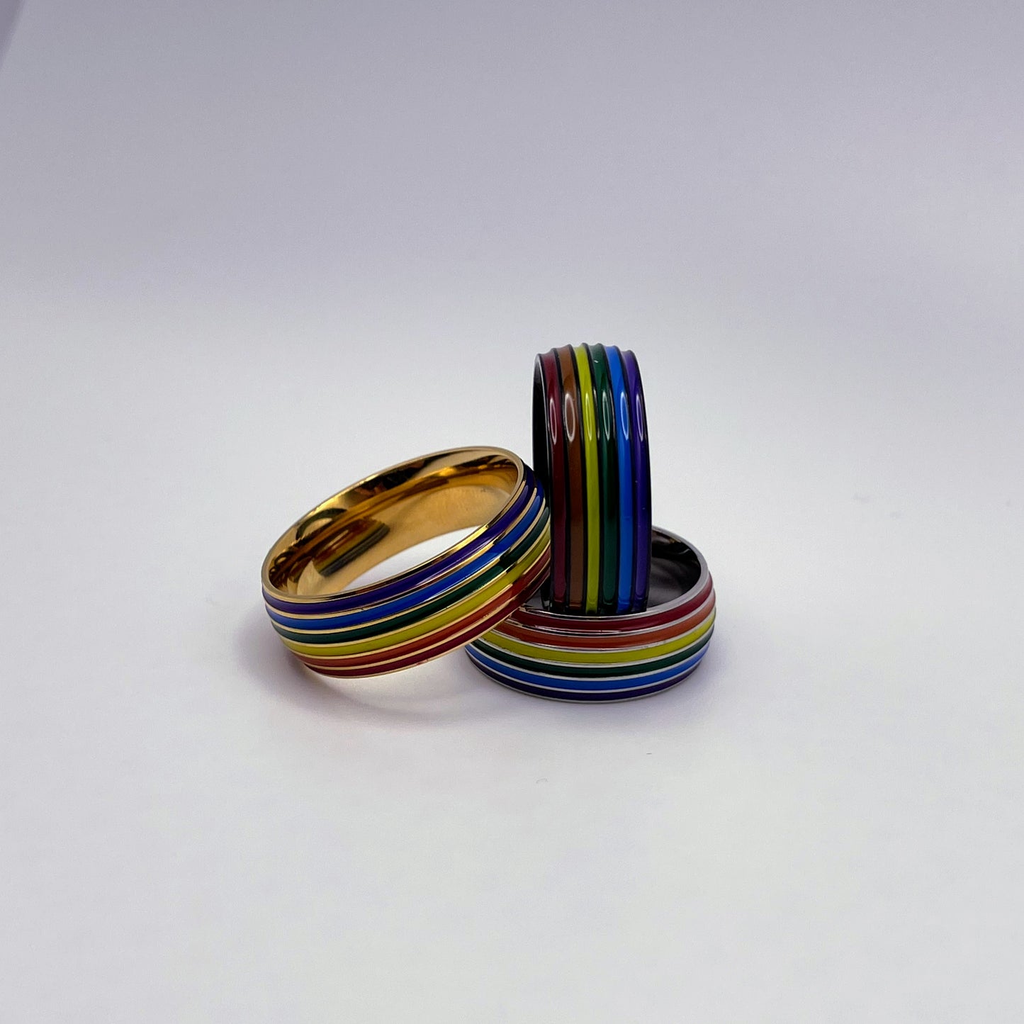 Rainbow comfort fit ring on black stainless steel
